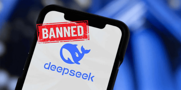 Smartphone showing the deepseek AI app logo with a red BANNED stamp over a blurred blue background