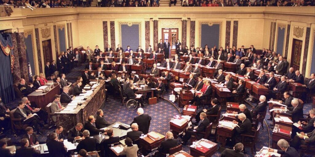 U.S. Senate chamber in session with senators seated at desks during proceedings